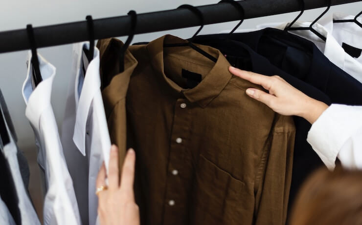 person-shopping-looking-at-shirts-with-collars.jpg