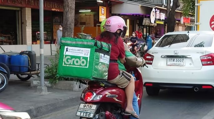 Cuộc chiến đốt tiền trong thị trường giao đồ ăn: Grab 'ví dày nhất', chiếm ngôi vương ở 7 thị trường nhưng mãi không có lãi