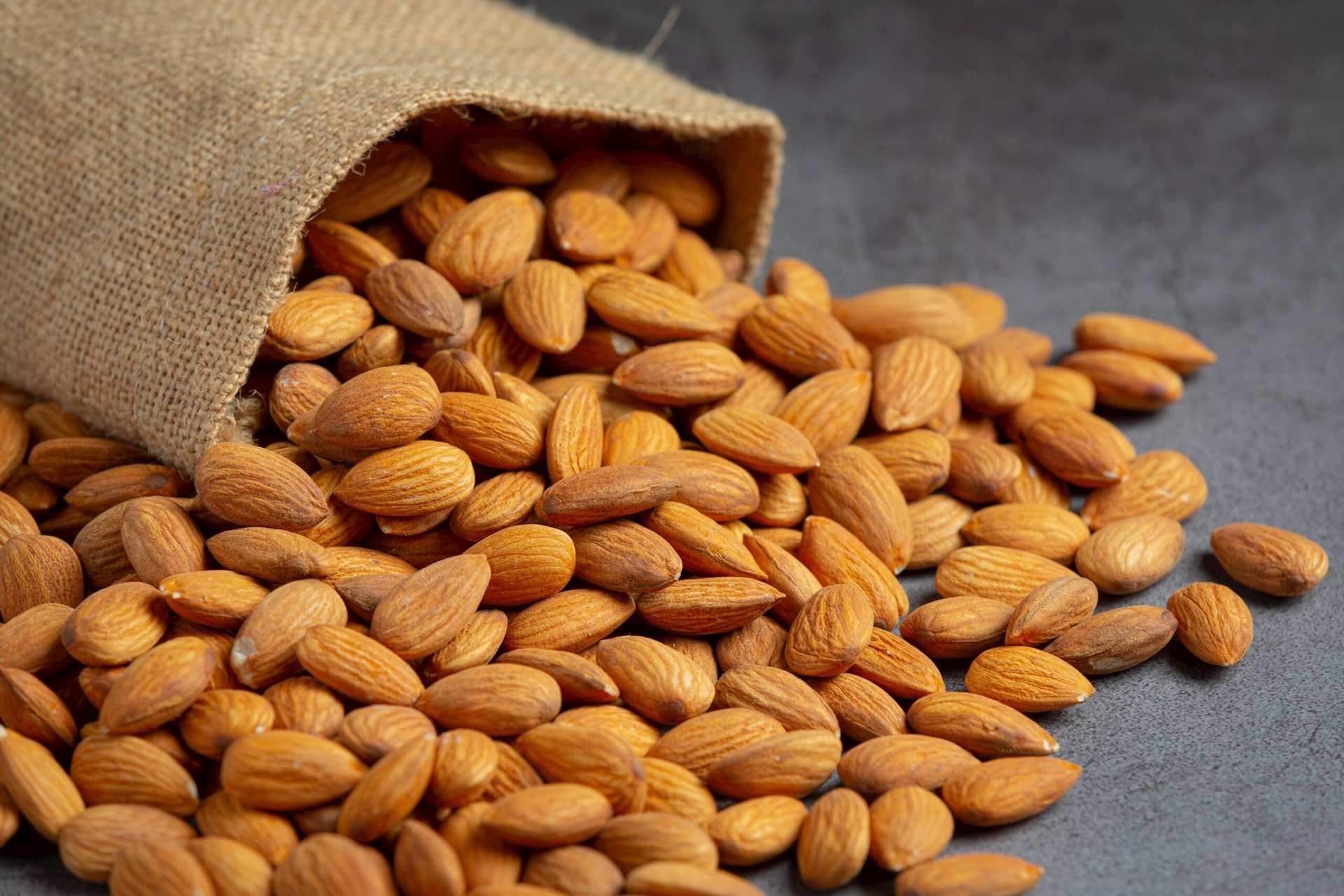 almonds-bag-from-sackingl-dark-background-min-scaled.jpg