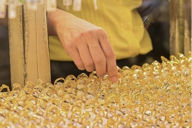 Căng thẳng thương mại hạ nhiệt kéo giảm giá vàng