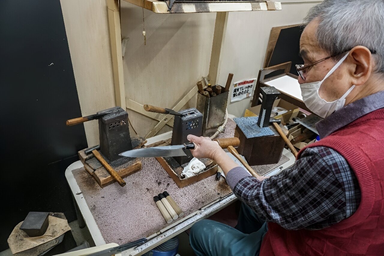 a-craftsman-attaches-a.jpg