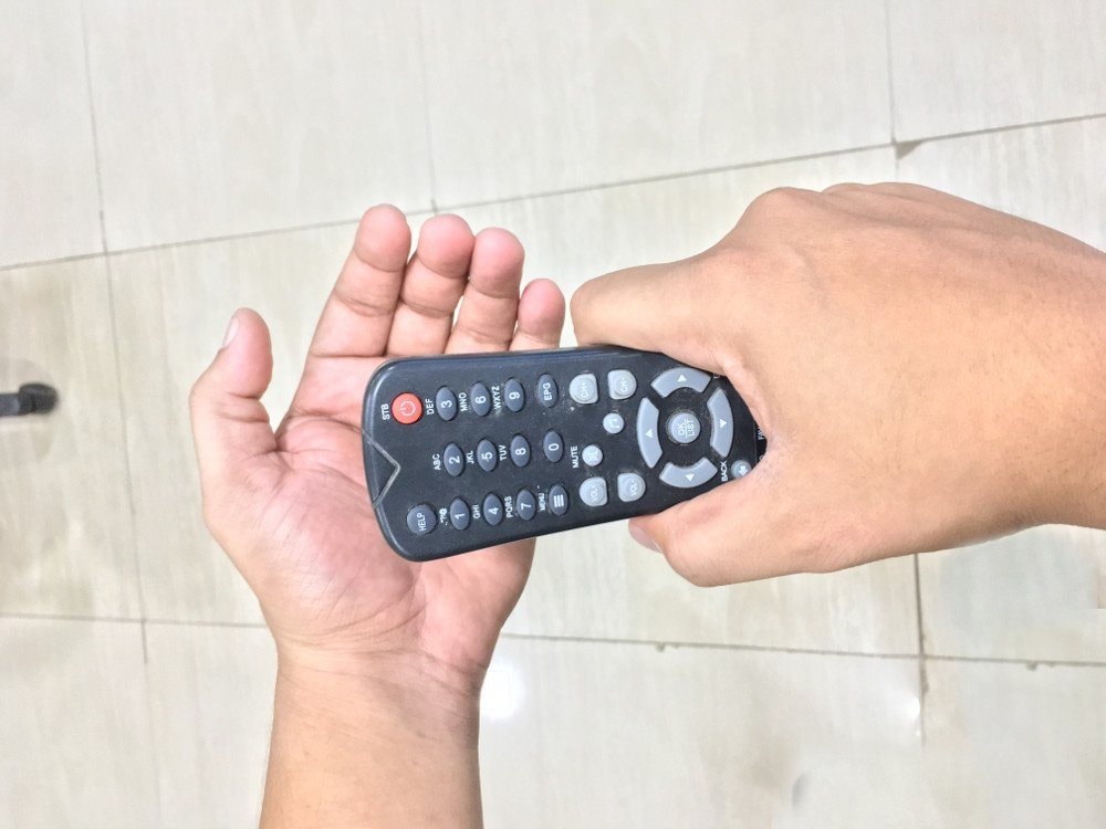 tv-remote-smacking-on-hand.jpg