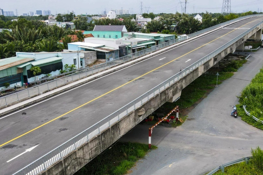 Sau 6 năm khởi công, cây cầu 500 tỉ đồng nối huyện Bình Chánh với Nhà Bè sắp thông xe dịp 2/9